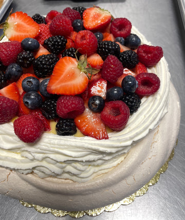 *Pavlova with Lemon Curd, Whipped Cream and Assorted Fresh Berries