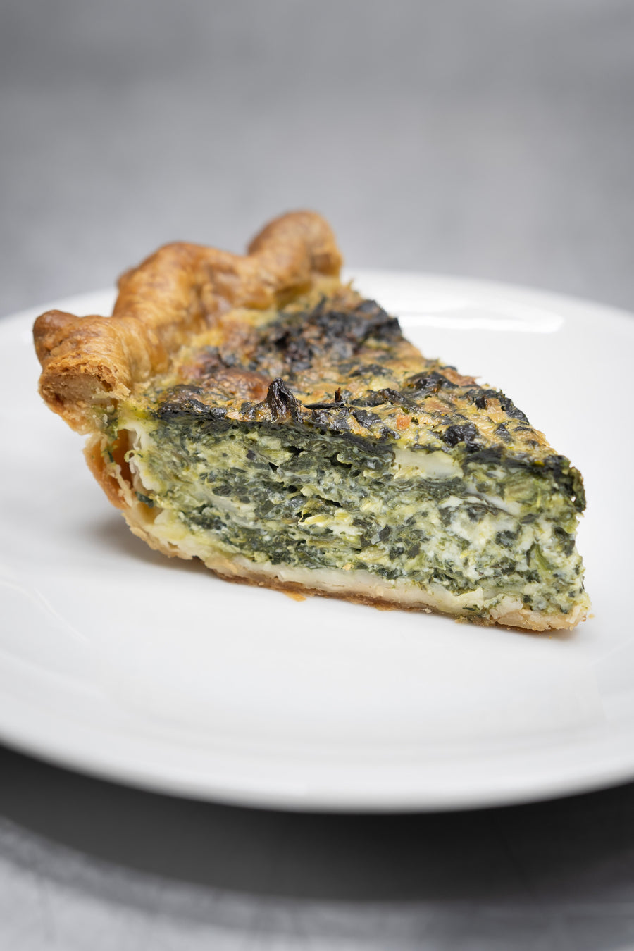 Quiche by the slice: Spinach & Swiss